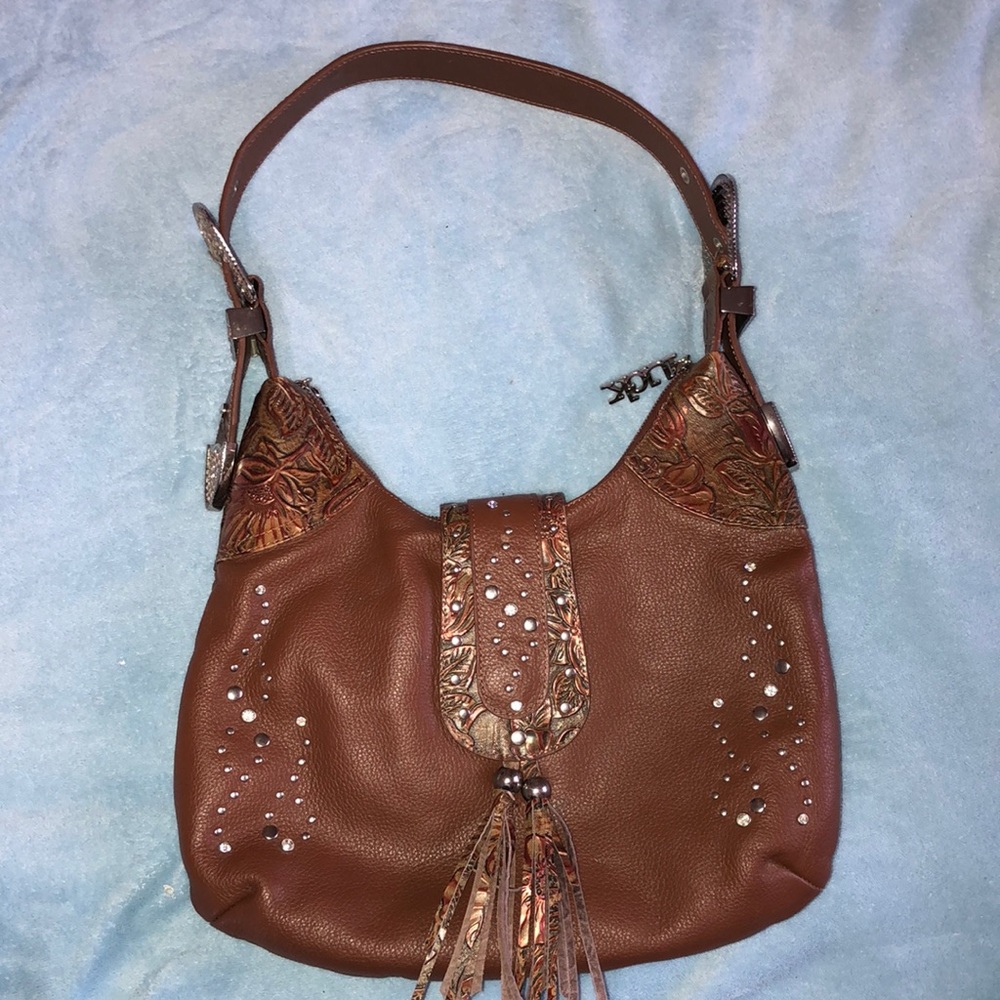 Charm and Luck brand shoulder purse